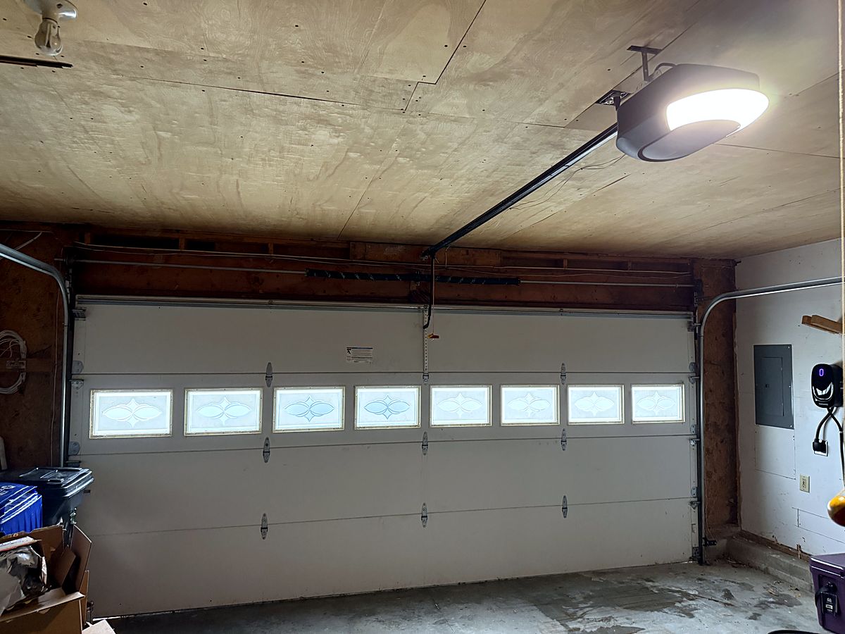 Garage door with decorative windows and an LED opener in Manchester